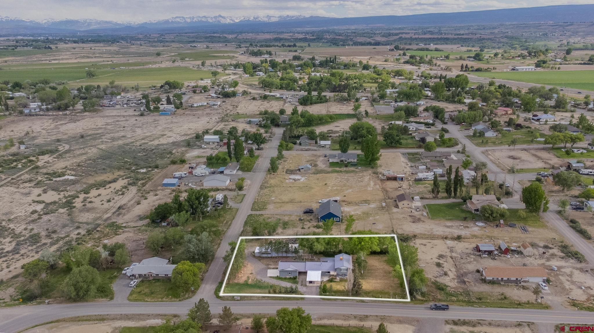 60918 Gunnison Road Montrose, CO 81401 - Photo 12 of 37 an aerial view of multiple house