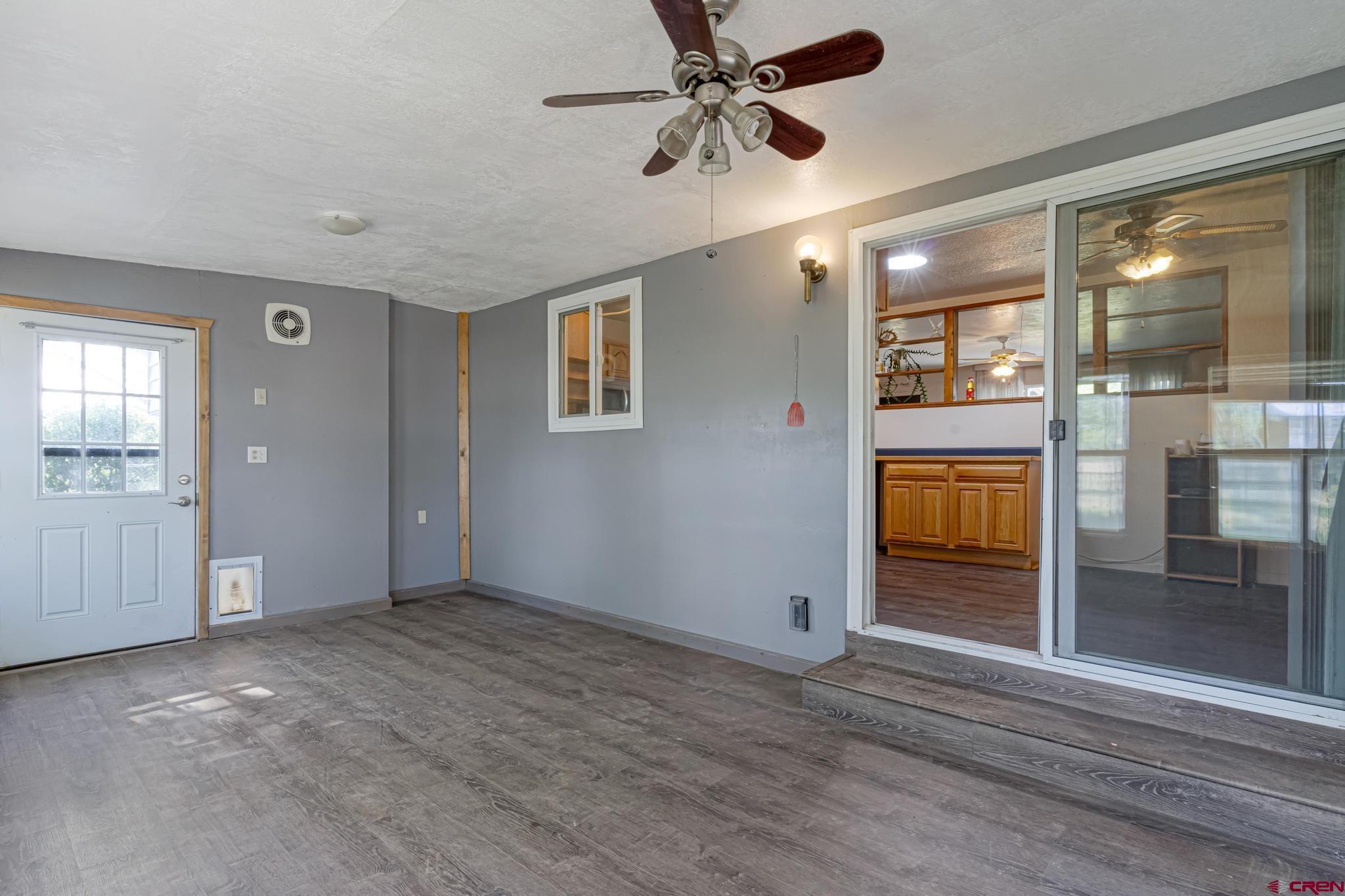 60918 Gunnison Road Montrose, CO 81401 - Photo 23 of 37 a view of an empty room with a window