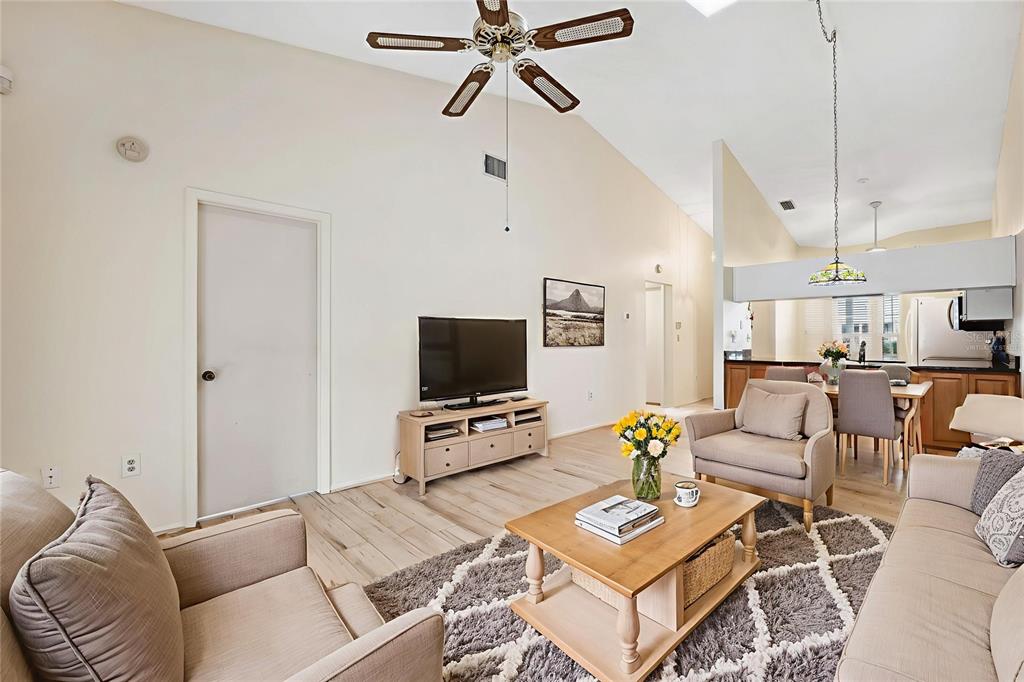 6506 Remus Drive New Port Richey, FL 34653 - Photo 9 of 32 a living room with furniture and a flat screen tv