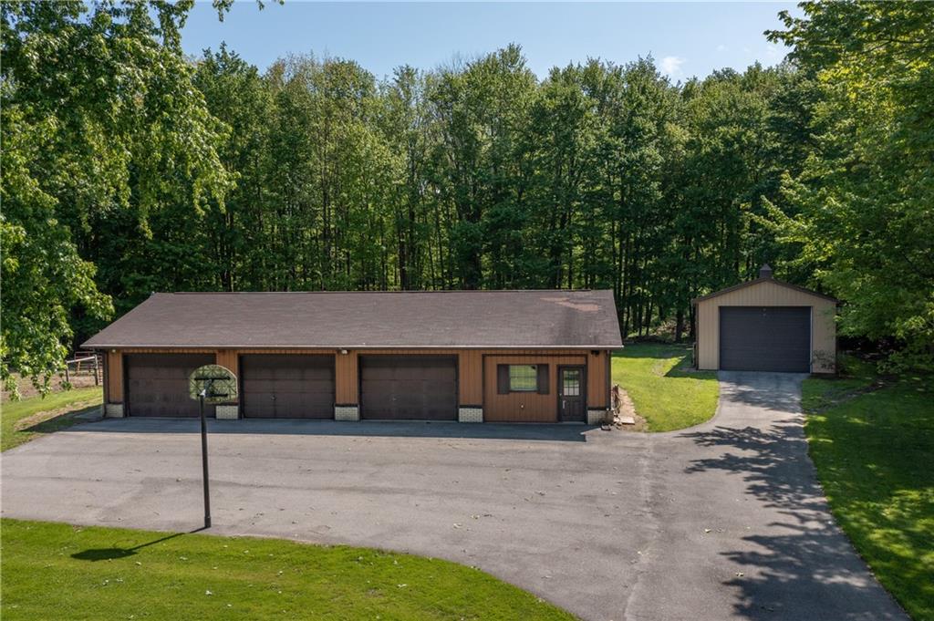 3381 Hadley Road Hadley, PA 16130 - Photo 3 of 25 a house that has a big yard