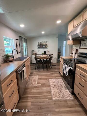 3125 Pacetti Road St. Augustine, FL 32092 - Photo 6 of 14 a living room with furniture and a wooden floor