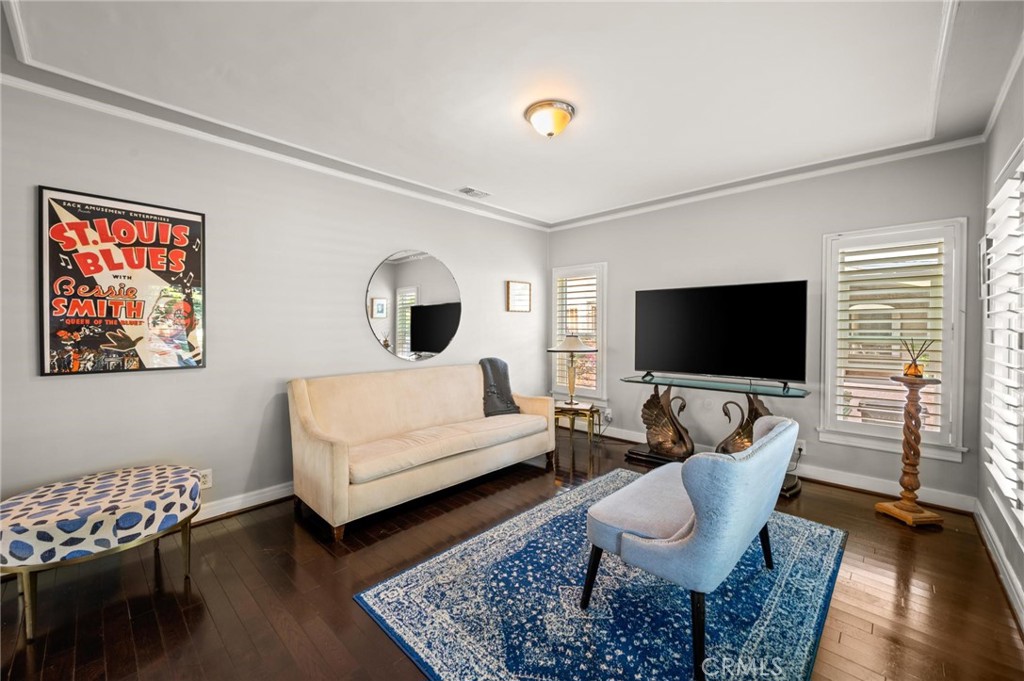 3441 Virginia Road Los Angeles, CA 90016 - Photo 2 of 40 a living room with furniture and a flat screen tv