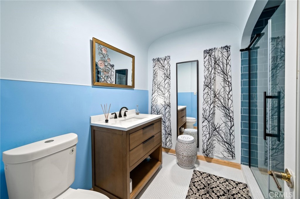 3441 Virginia Road Los Angeles, CA 90016 - Photo 22 of 40 a bathroom with a sink toilet and shower