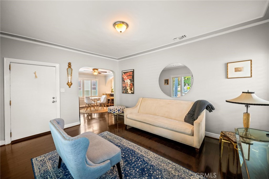 3441 Virginia Road Los Angeles, CA 90016 - Photo 3 of 40 a living room with furniture and wooden floor