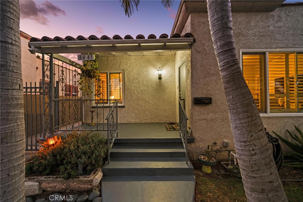 3441 Virginia Road Los Angeles, CA 90016 - Photo 36 of 40 a view of a pathway with a fountain in the patio