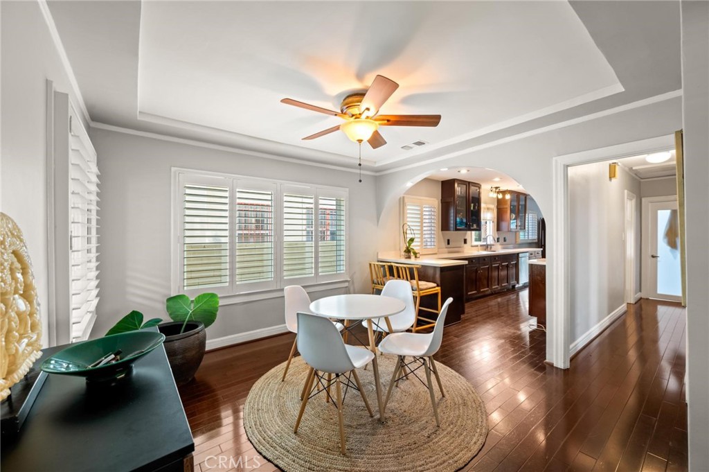 3441 Virginia Road Los Angeles, CA 90016 - Photo 5 of 40 a dining room with furniture a chandelier and wooden floor