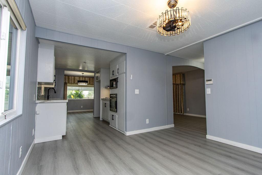 520 Allen Way Turlock, CA 95380 - Photo 16 of 39 a view of an empty room and kitchen with a window