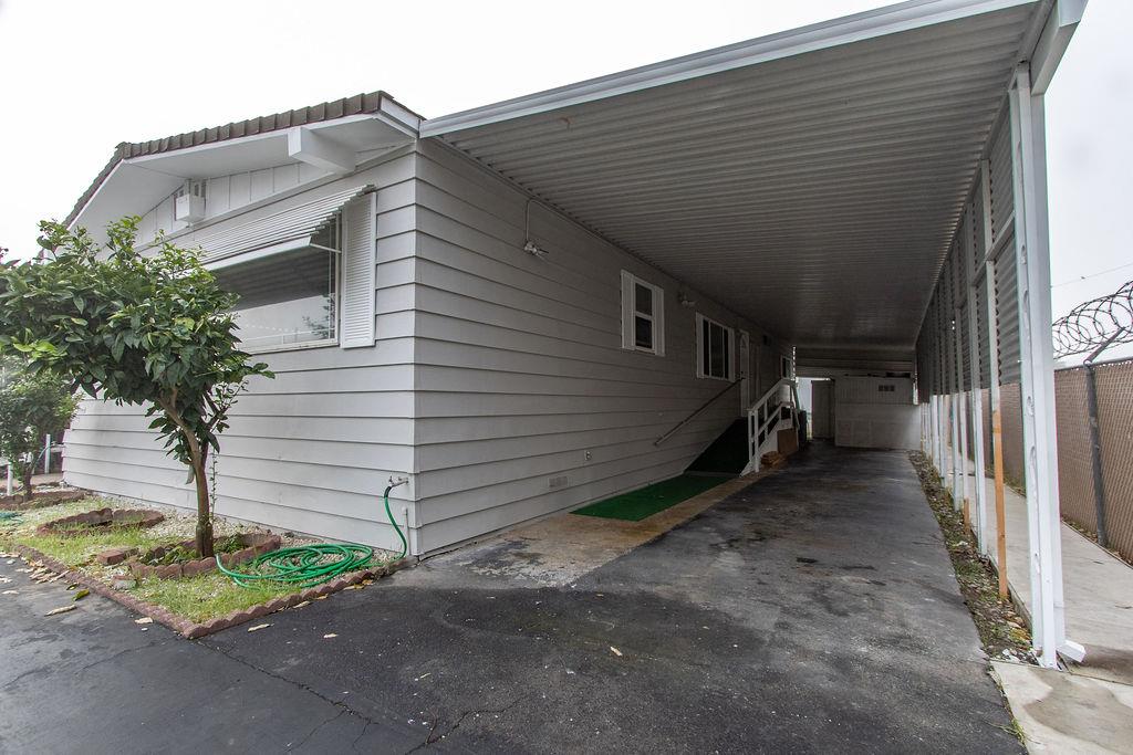 520 Allen Way Turlock, CA 95380 - Photo 35 of 39 a view of a house with backyard and trees