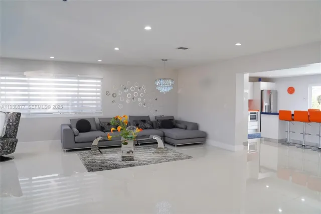 a view of a swimming pool with a yard