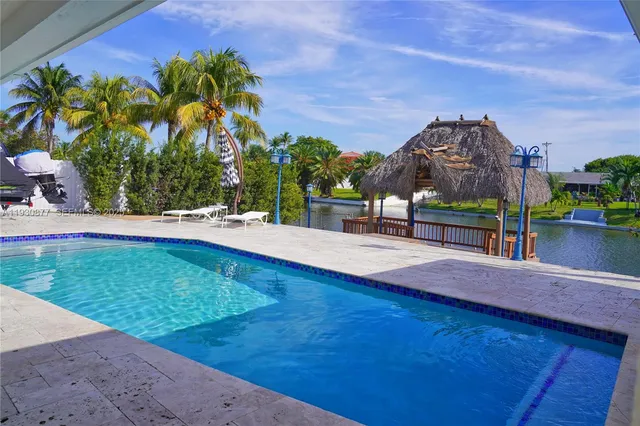 a outdoor space with patio the couches and a dining table with garden view