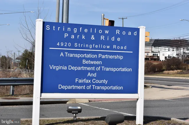 a view of a street with a building in the background
