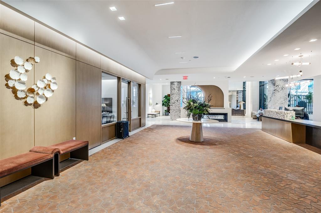 3003 Maple Avenue, Unit 2220 Dallas, TX 75201 - Photo 35 of 40 a lobby with furniture and a chandelier