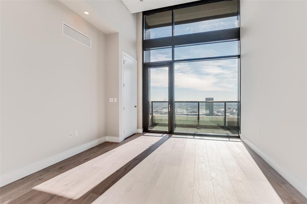 3003 Maple Avenue, Unit 2220 Dallas, TX 75201 - Photo 9 of 40 a view of a room with a large window