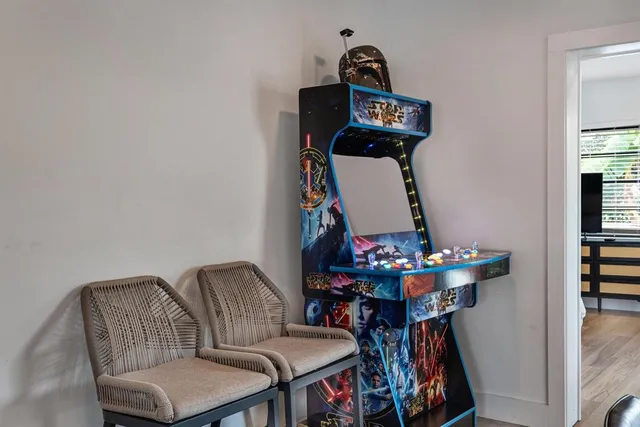 a view of a chairs and table in a backyard