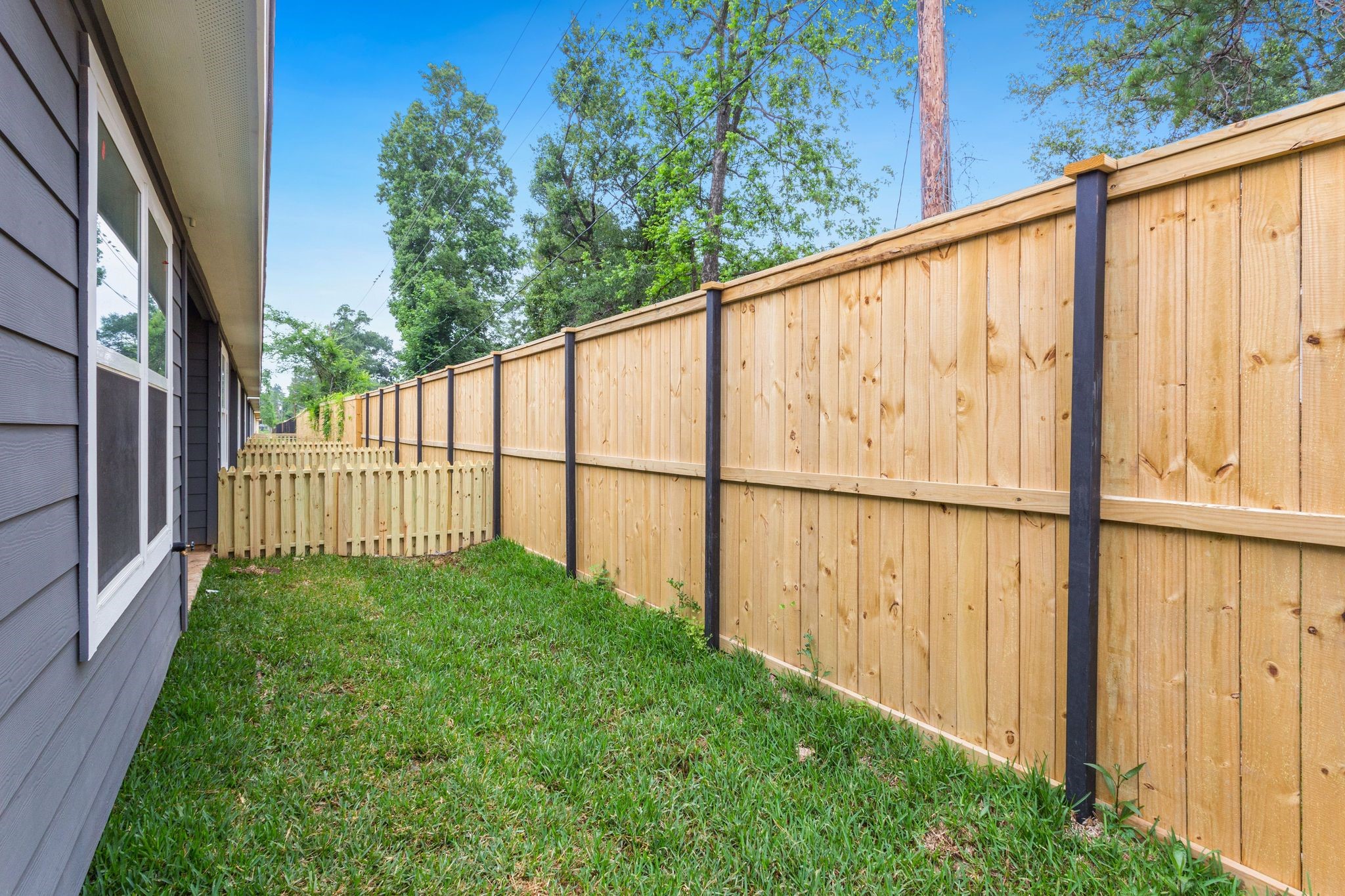 10317 Lake Road, Unit 13B Houston, TX 77070 - Photo 24 of 28 a view of a pathway with a backyard