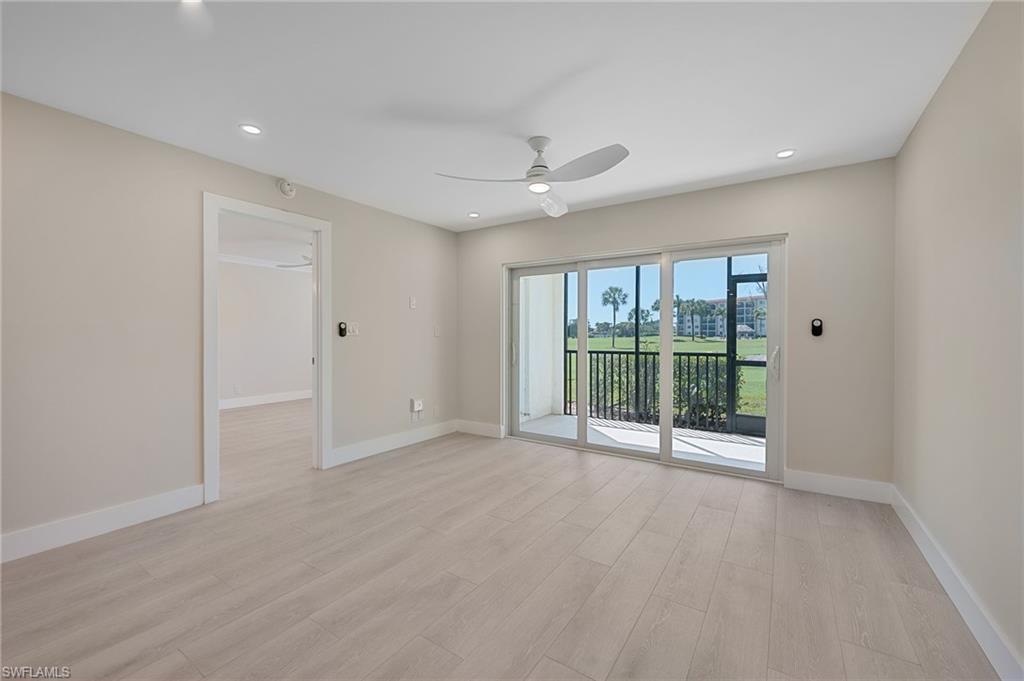 9 High Point Circle North, Unit 108 Naples, FL 34103 - Photo 10 of 17 Living Room to Primary Bedroom