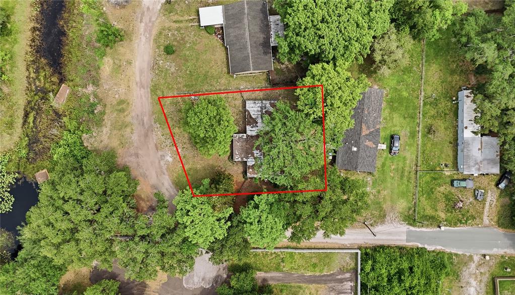 4791 Sunset Road St. Cloud, FL 34771 - Photo 5 of 7 an aerial view of a residential houses