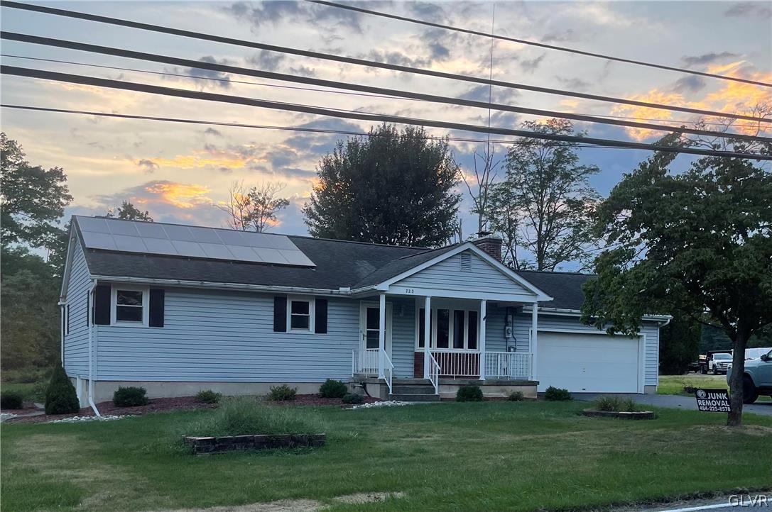 723 Bushkill Center Road Nazareth, PA 18064 - Photo 1 of 18 a front view of a house with a garden