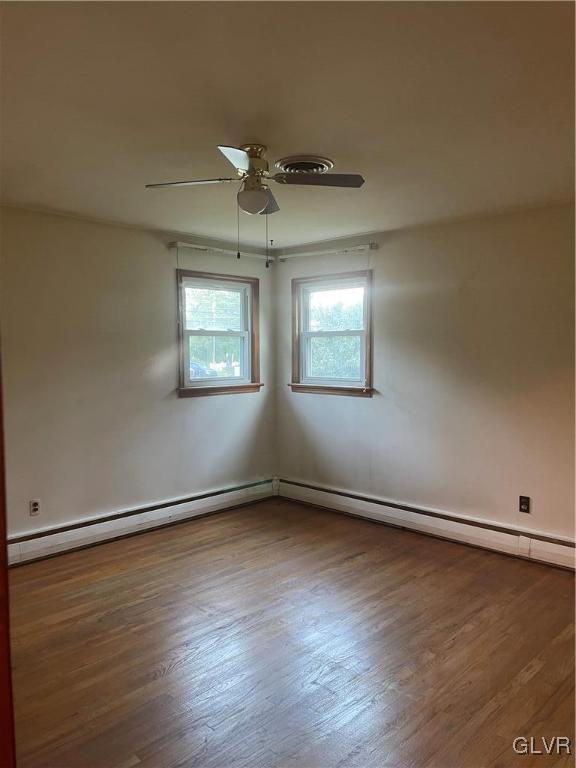 723 Bushkill Center Road Nazareth, PA 18064 - Photo 12 of 18 an empty room with wooden floor and windows