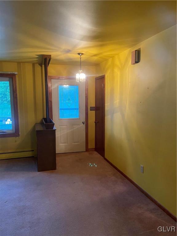 723 Bushkill Center Road Nazareth, PA 18064 - Photo 3 of 18 a view of a room with a fireplace and a window