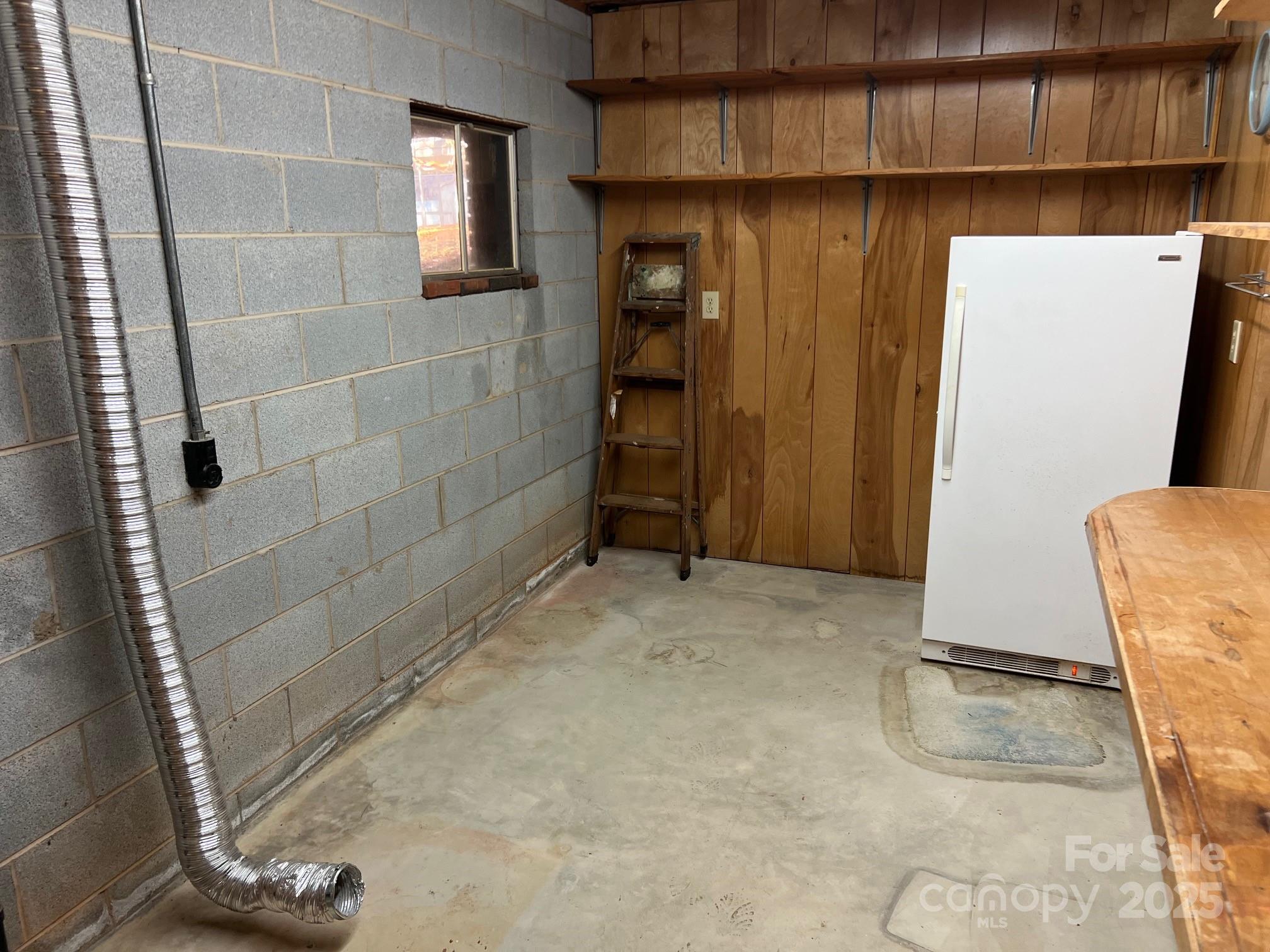 2819 Playmore Beach Road Morganton, NC 28655 - Photo 25 of 30 a view of an empty room with wooden door