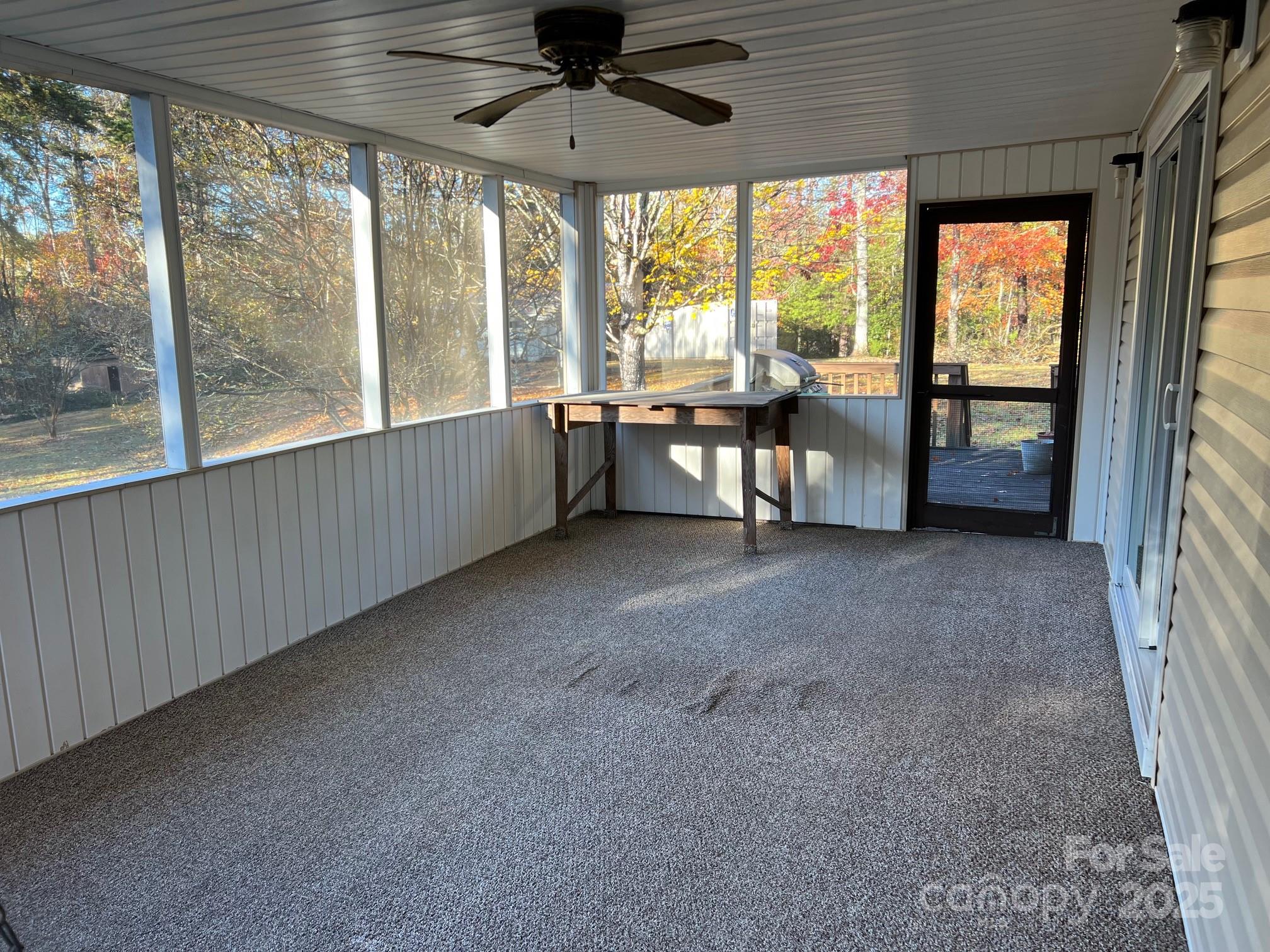 2819 Playmore Beach Road Morganton, NC 28655 - Photo 28 of 30 a view of a livingroom with furniture and a large window