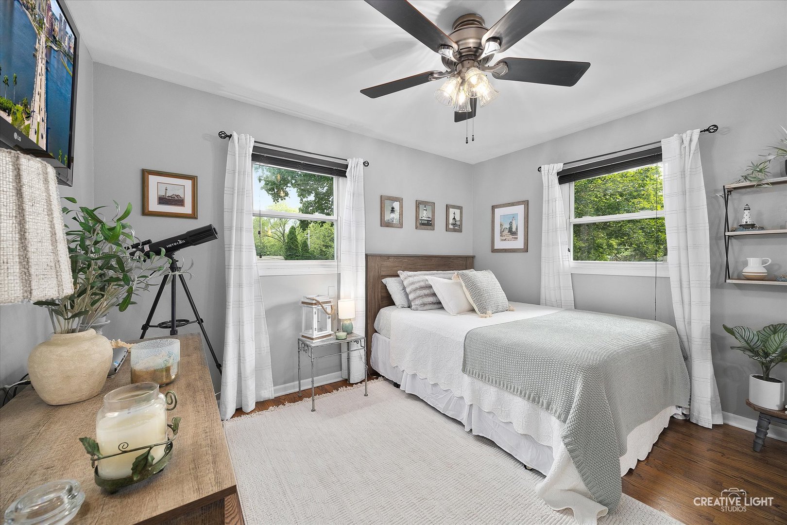 124 Fairview Drive St. Charles, IL 60174 - Photo 19 of 37 a bedroom with a bed and a chandelier