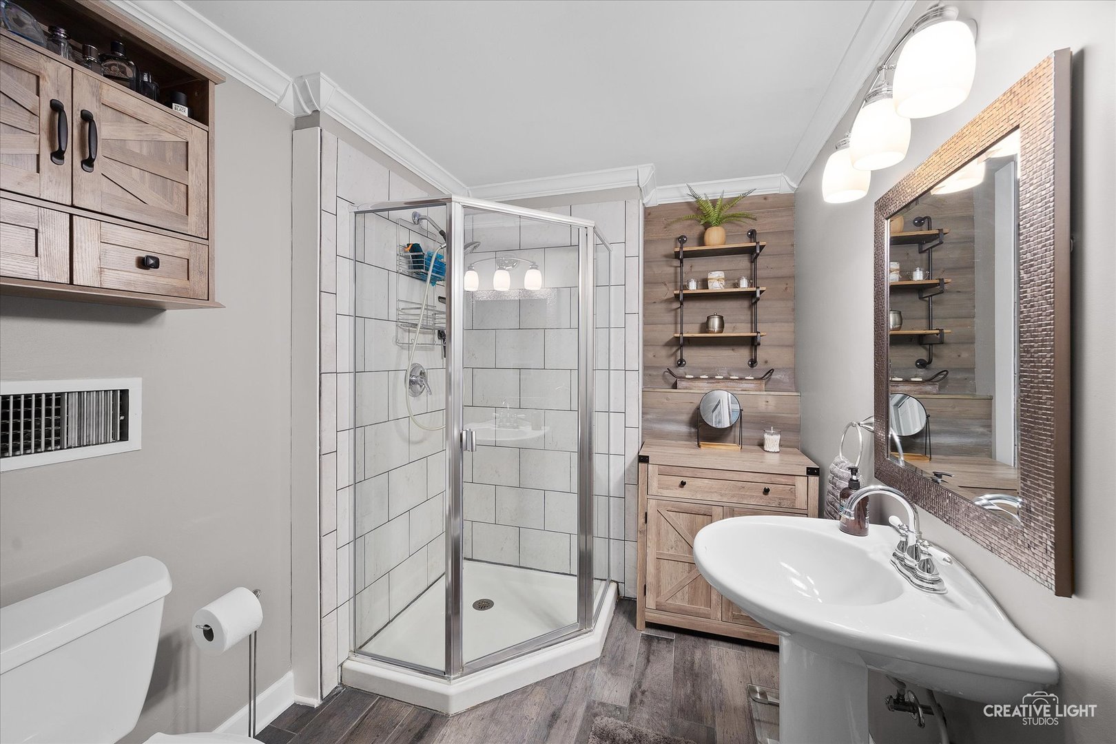 124 Fairview Drive St. Charles, IL 60174 - Photo 23 of 37 a bathroom with a sink toilet and shower