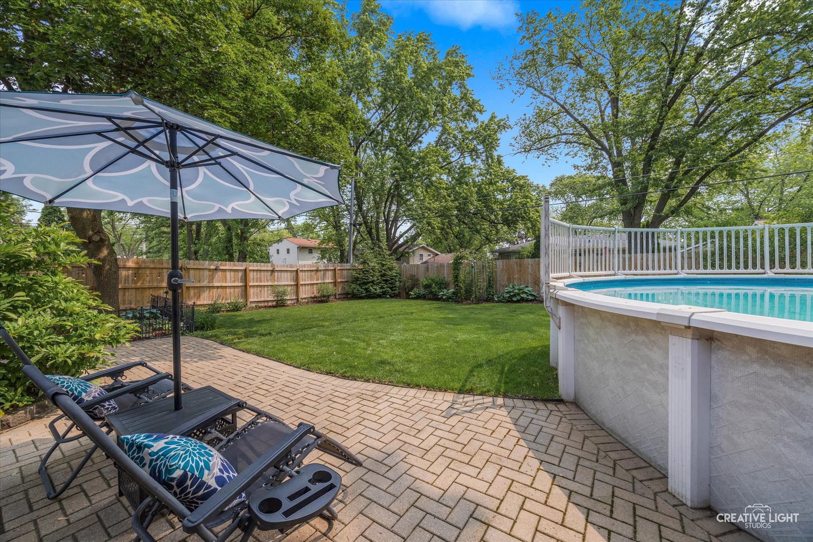 124 Fairview Drive St. Charles, IL 60174 - Photo 31 of 37 a view of a backyard with a patio