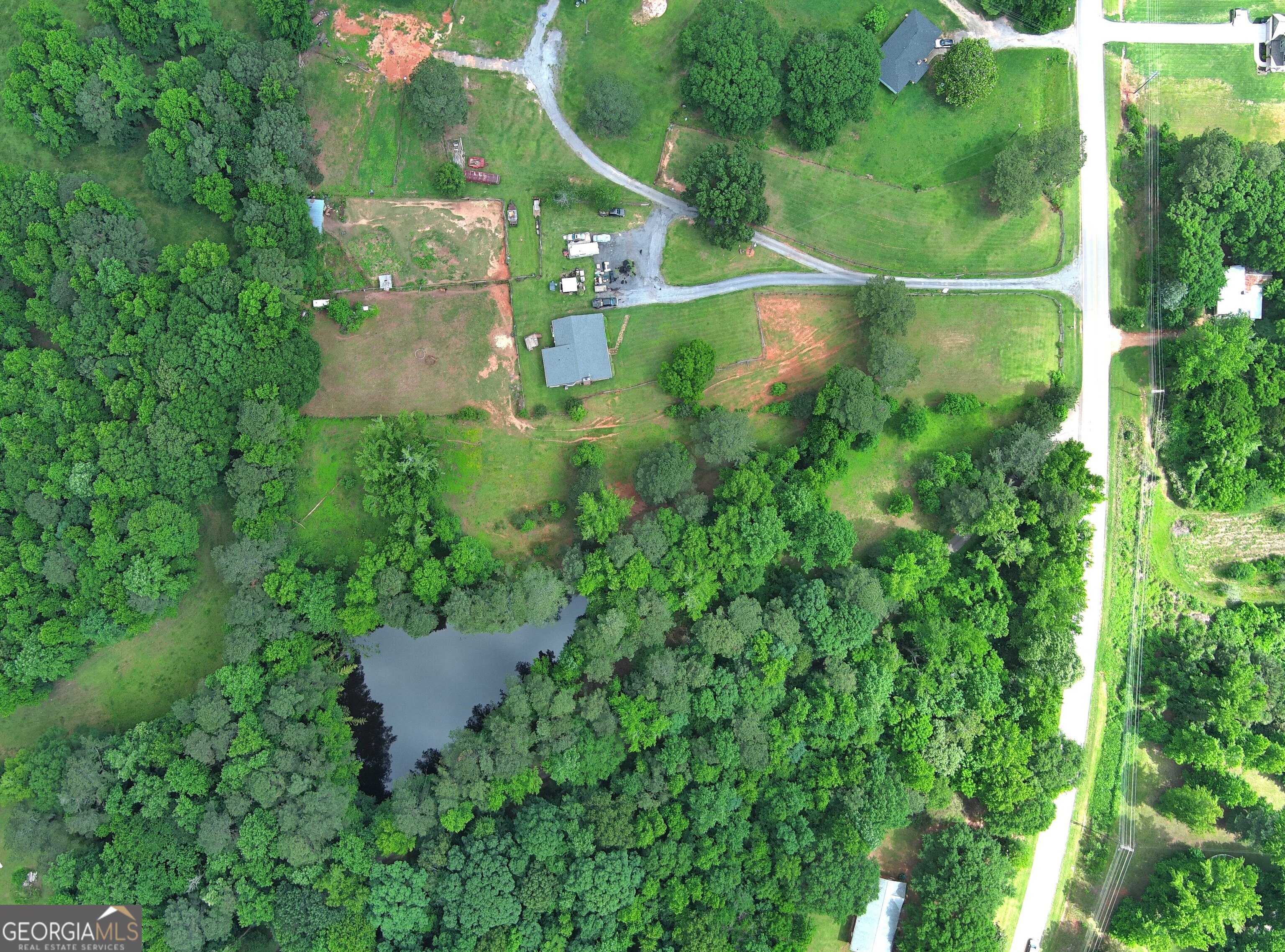 491 Thurman Road, Unit TRACT C Stockbridge, GA 30281 - Photo 14 of 18 an aerial view of residential house with outdoor space and trees all around