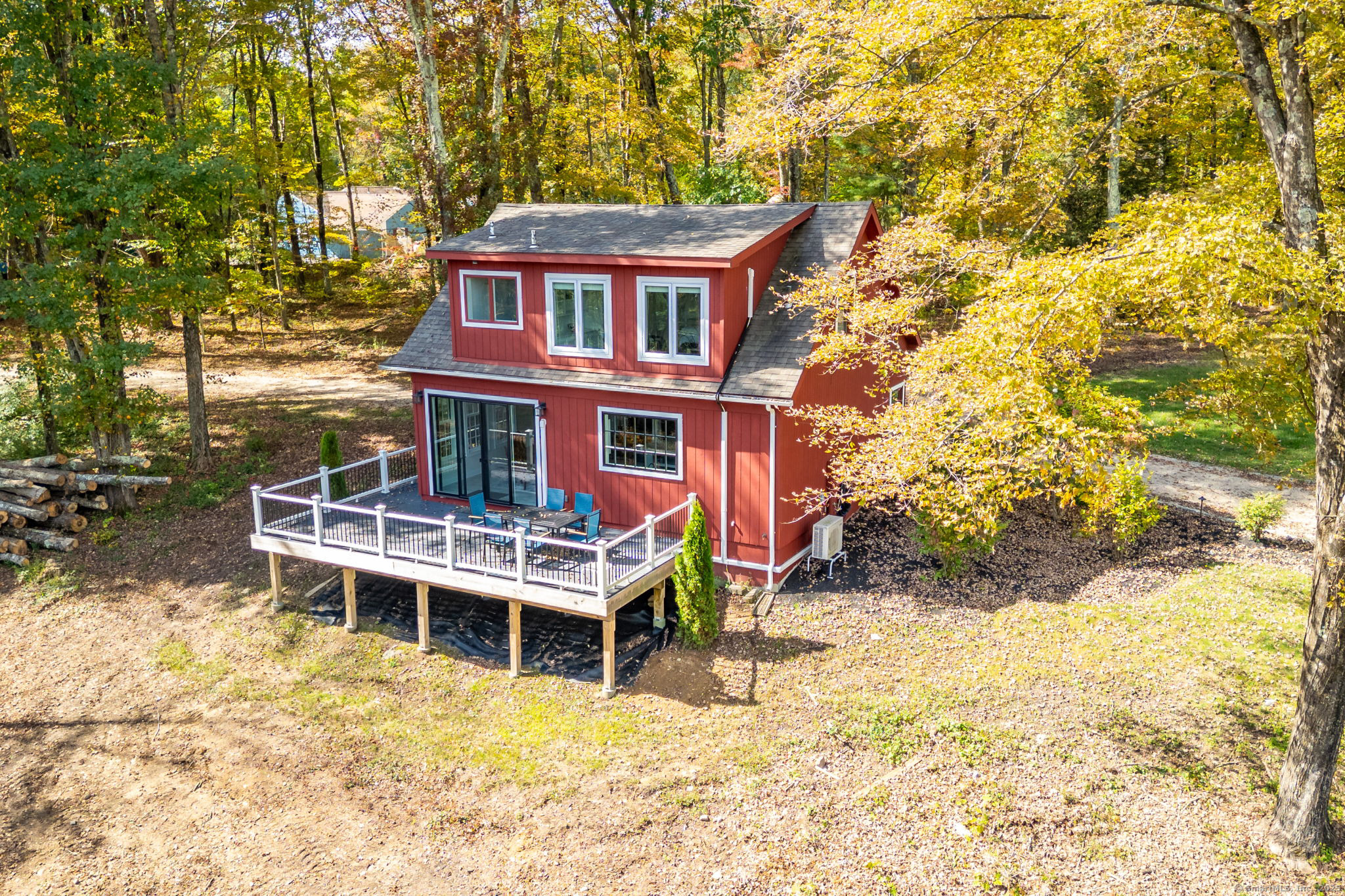235 White Deer Rock Road, Unit GUEST Woodbury, CT 06798 - Photo 17 of 21 a balcony with table and chairs