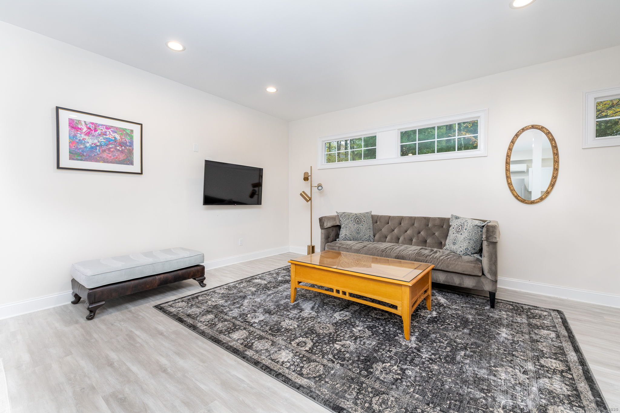 235 White Deer Rock Road, Unit GUEST Woodbury, CT 06798 - Photo 3 of 21 a living room with furniture and a flat screen tv