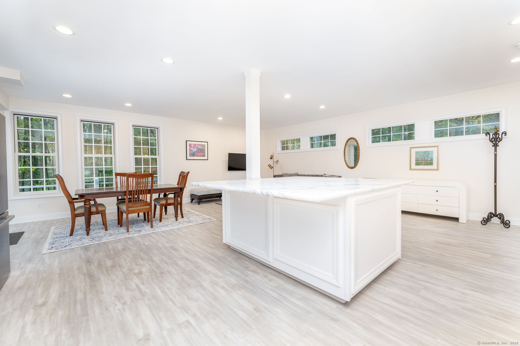 235 White Deer Rock Road, Unit GUEST Woodbury, CT 06798 - Photo 8 of 21 a living room with furniture and wooden floor