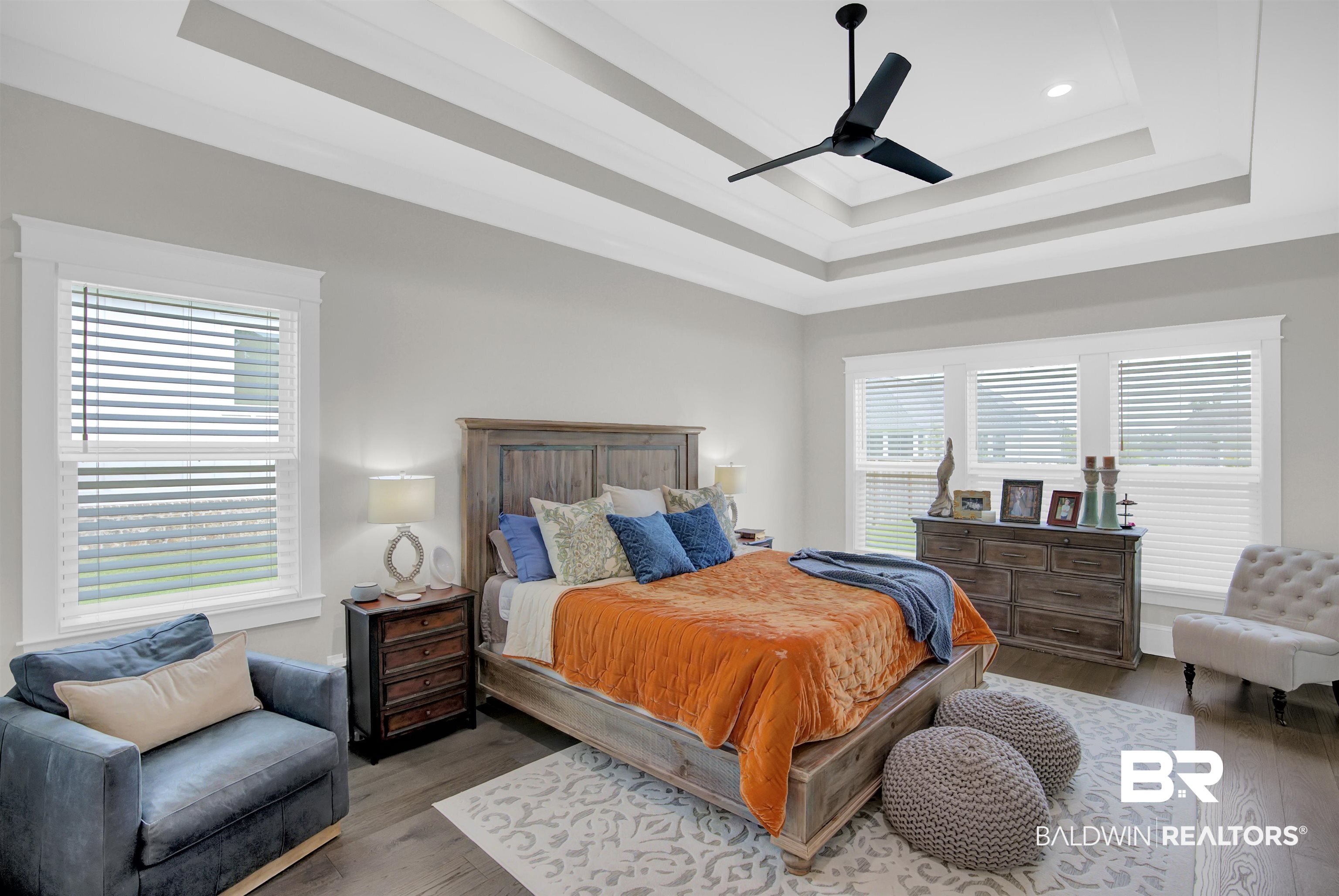 10940 Atrium Avenue Fairhope, AL 36532 - Photo 21 of 43 Bedroom featuring multiple windows, ceiling fan, and hardwood / wood-style flooring