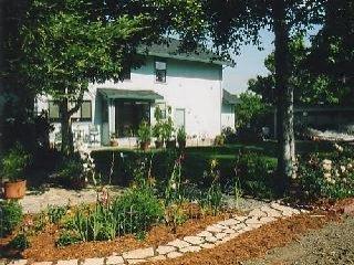 2097 Fulton Road Santa Rosa, CA 95403 - Photo 2 of 5 a front view of a house with a yard and lake view
