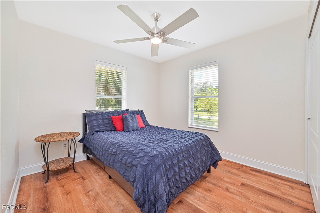 6840 Cadet Avenue Fort Myers, FL 33905 - Photo 31 of 37 a bedroom with a bed and a window