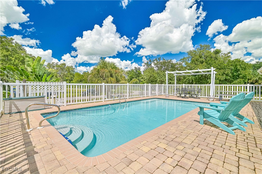 6840 Cadet Avenue Fort Myers, FL 33905 - Photo 10 of 37 a view of a balcony with wooden floor