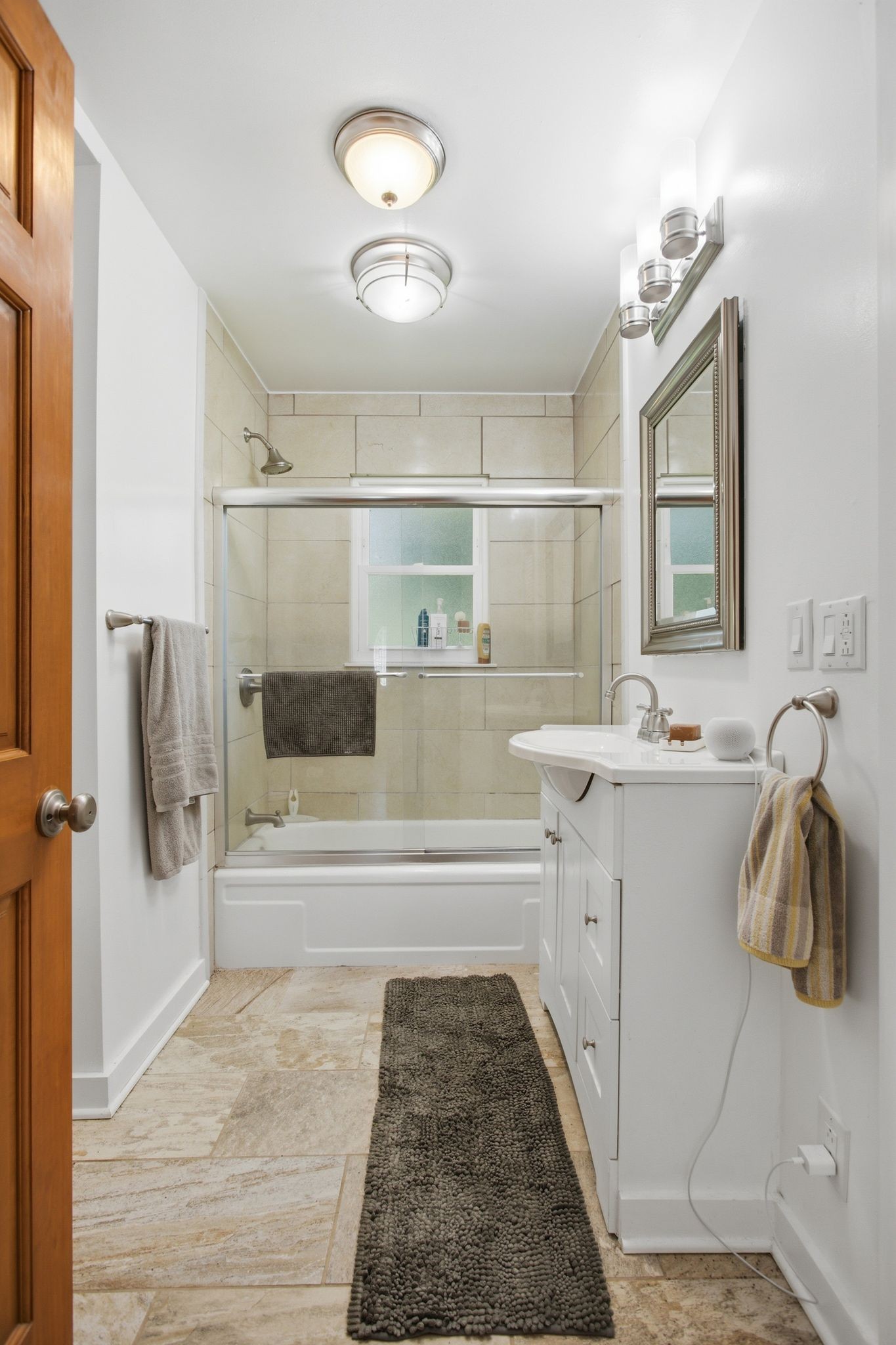 150 Toms Creek Road Linden, TN 37096 - Photo 12 of 23 a spacious bathroom with a sink a mirror and shower