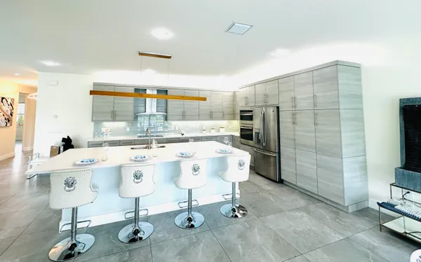 a view of kitchen appliances and window