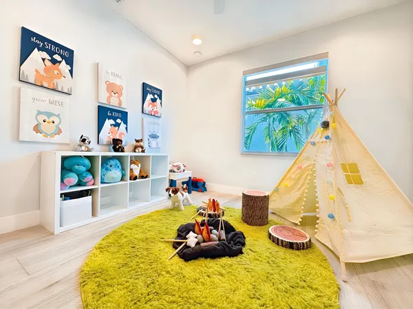 a room with furniture and a wooden floor