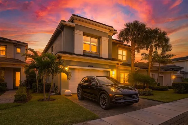 a car parked in front of a house