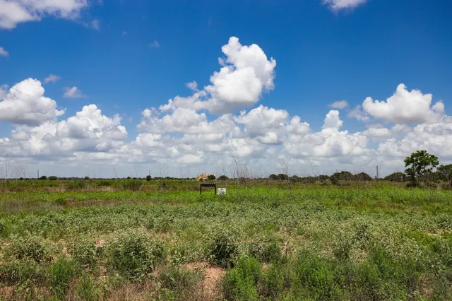 a view of a yard with an outdoor space and seating area