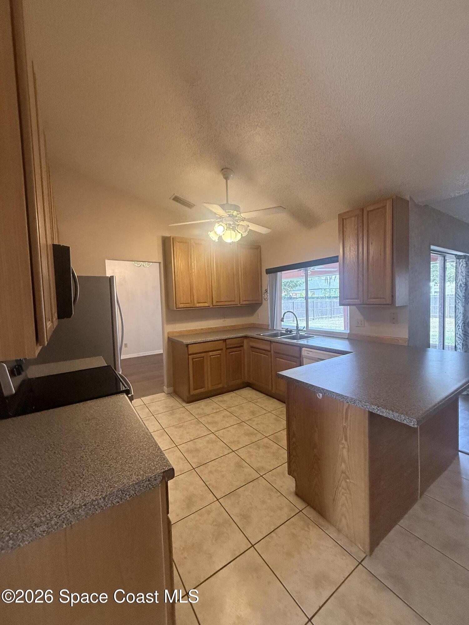 1660 Wake Forest Road Northwest Palm Bay, FL 32907 - Photo 3 of 15 Heart Of The Home