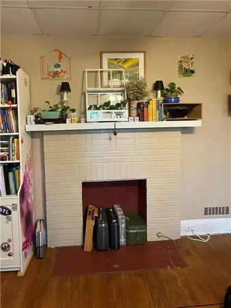 a view of livingroom with furniture and fireplace