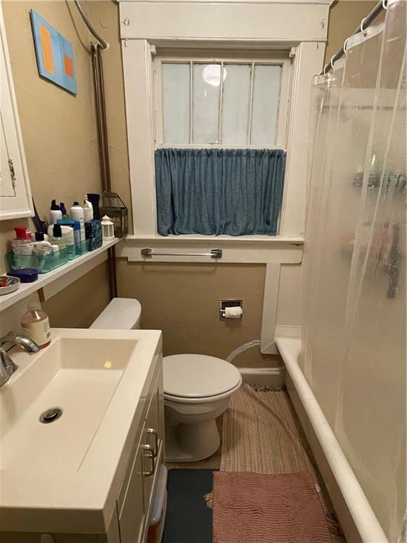 132 Huron Street, Unit 2 Decatur, GA 30030 - Photo 8 of 11 a bathroom with a sink toilet and shower