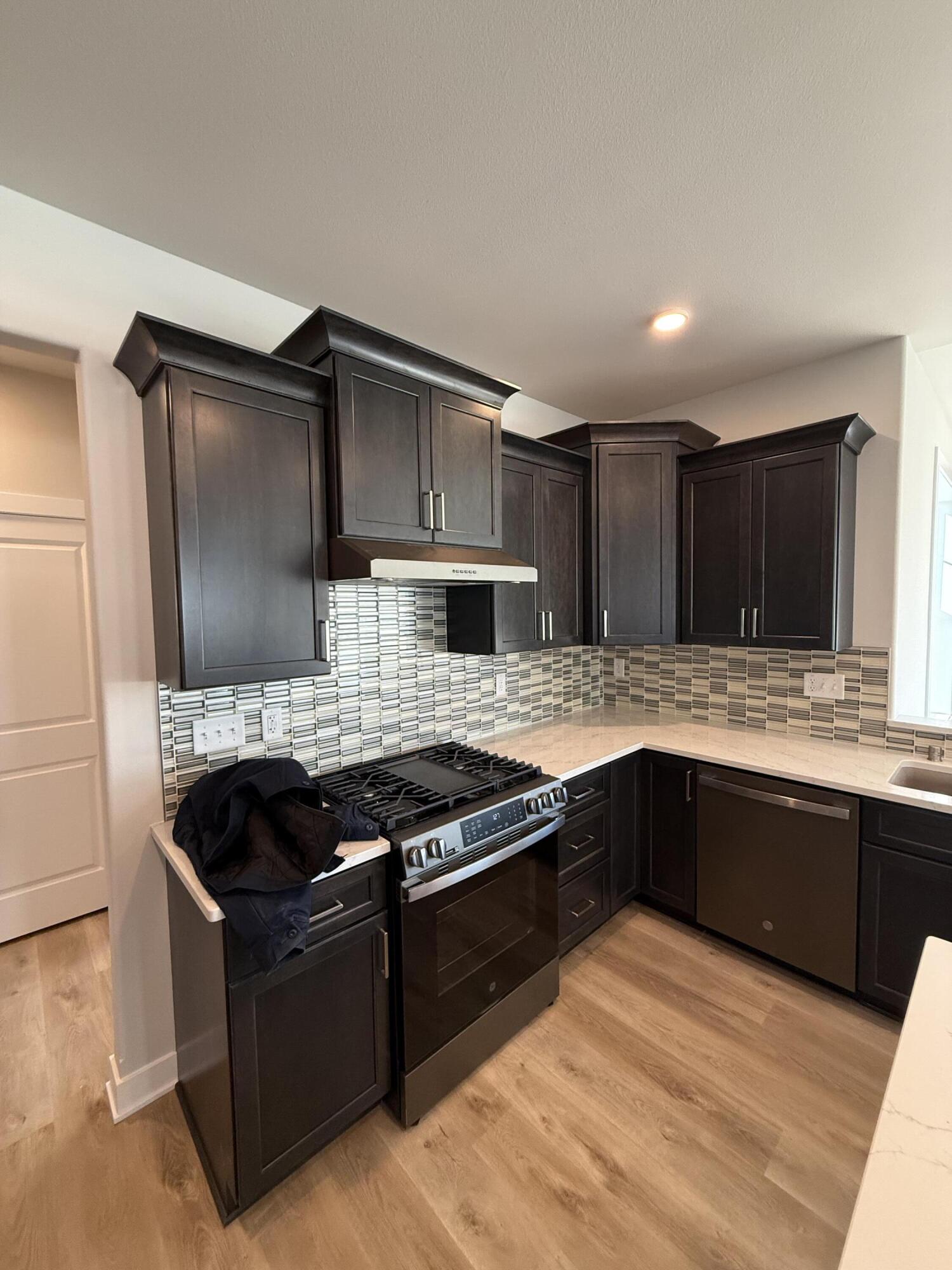 2402 Hoods Creek Path Mount, Unit LT98 Mount Pleasant, WI 53406 - Photo 6 of 22 Kitchen - Range Wall
