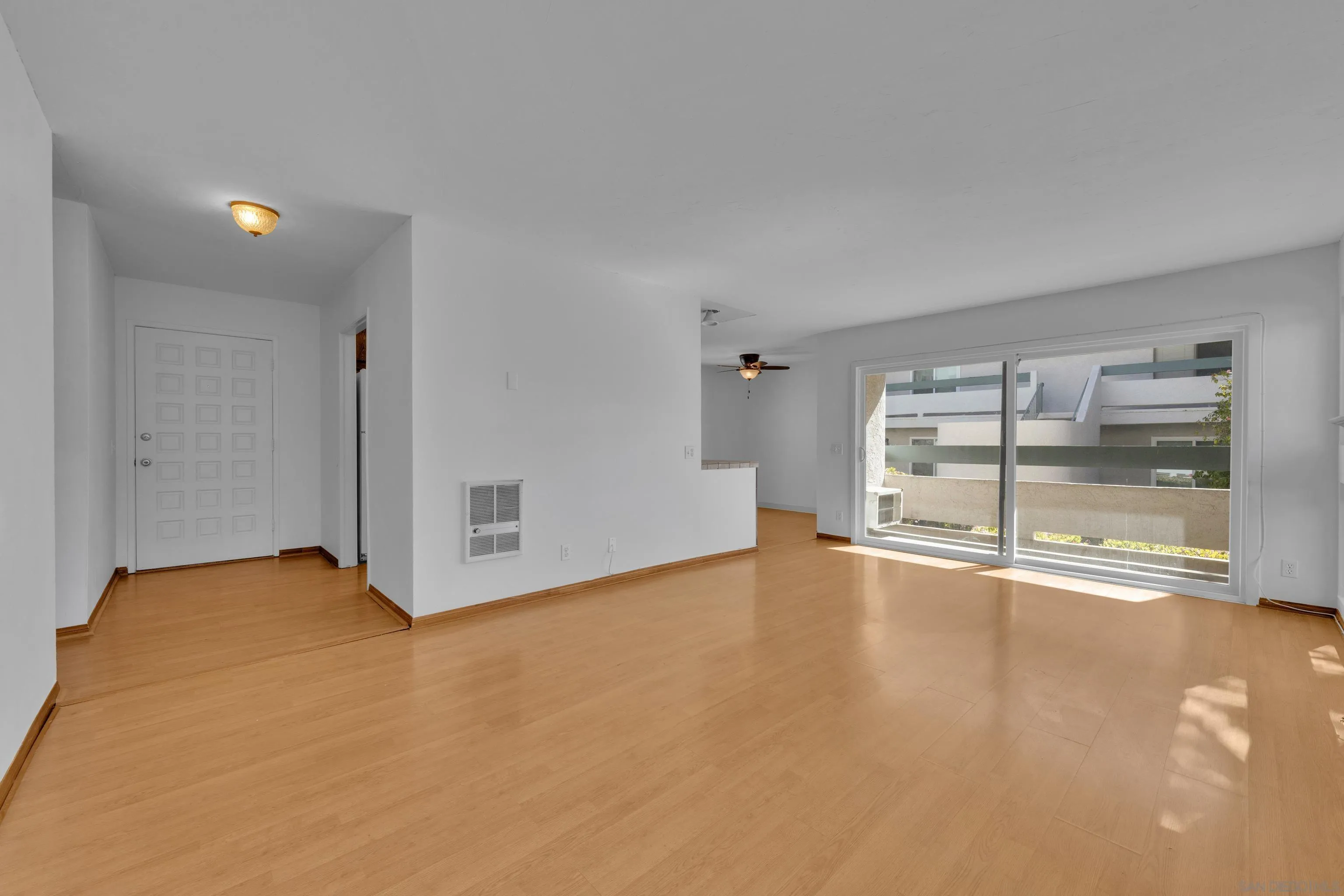 2308 Altisma Way, Unit 118 Carlsbad, CA 92009 - Photo 25 of 51 a view of an empty room with a window