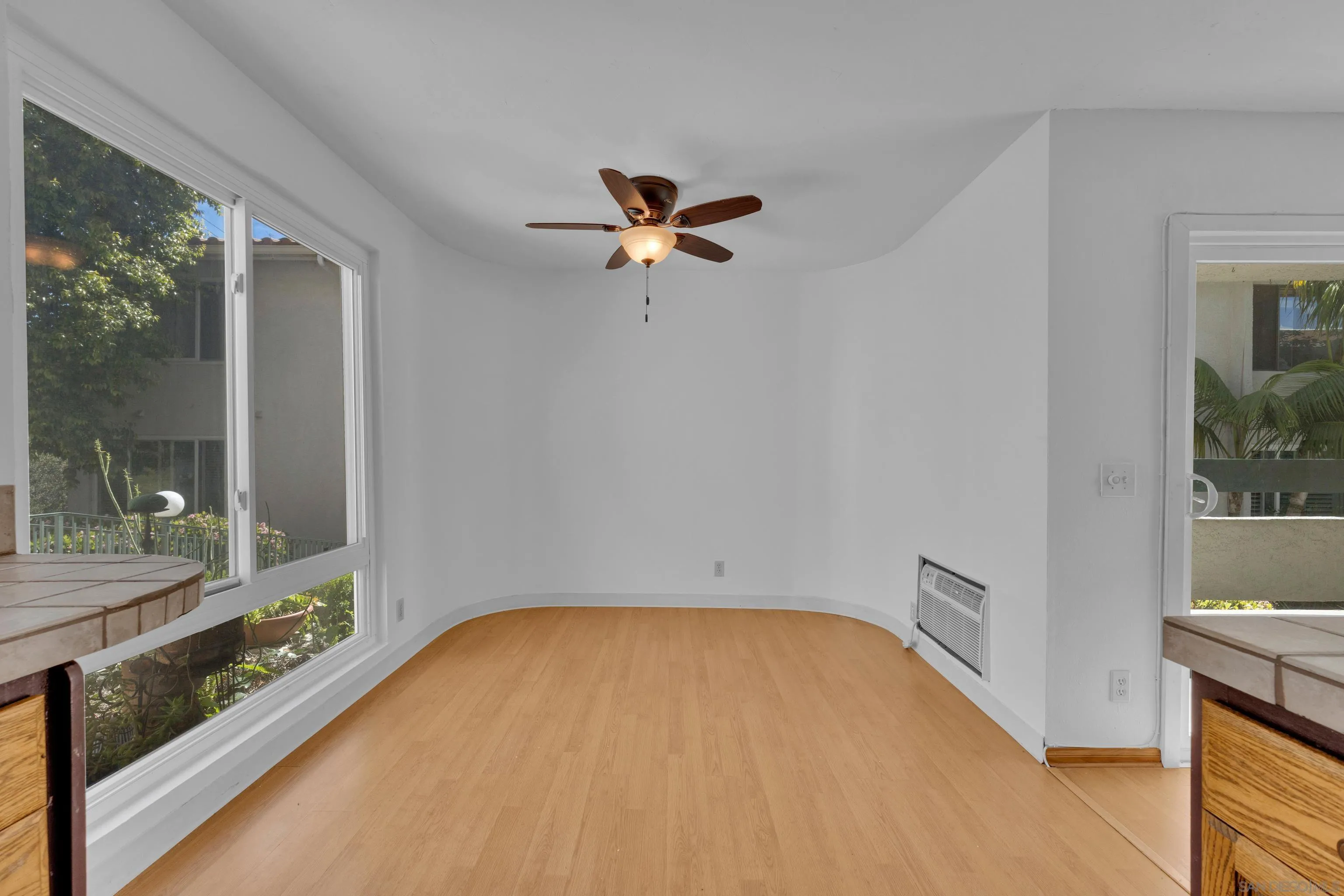 2308 Altisma Way, Unit 118 Carlsbad, CA 92009 - Photo 31 of 51 a view of room with a ceiling fan