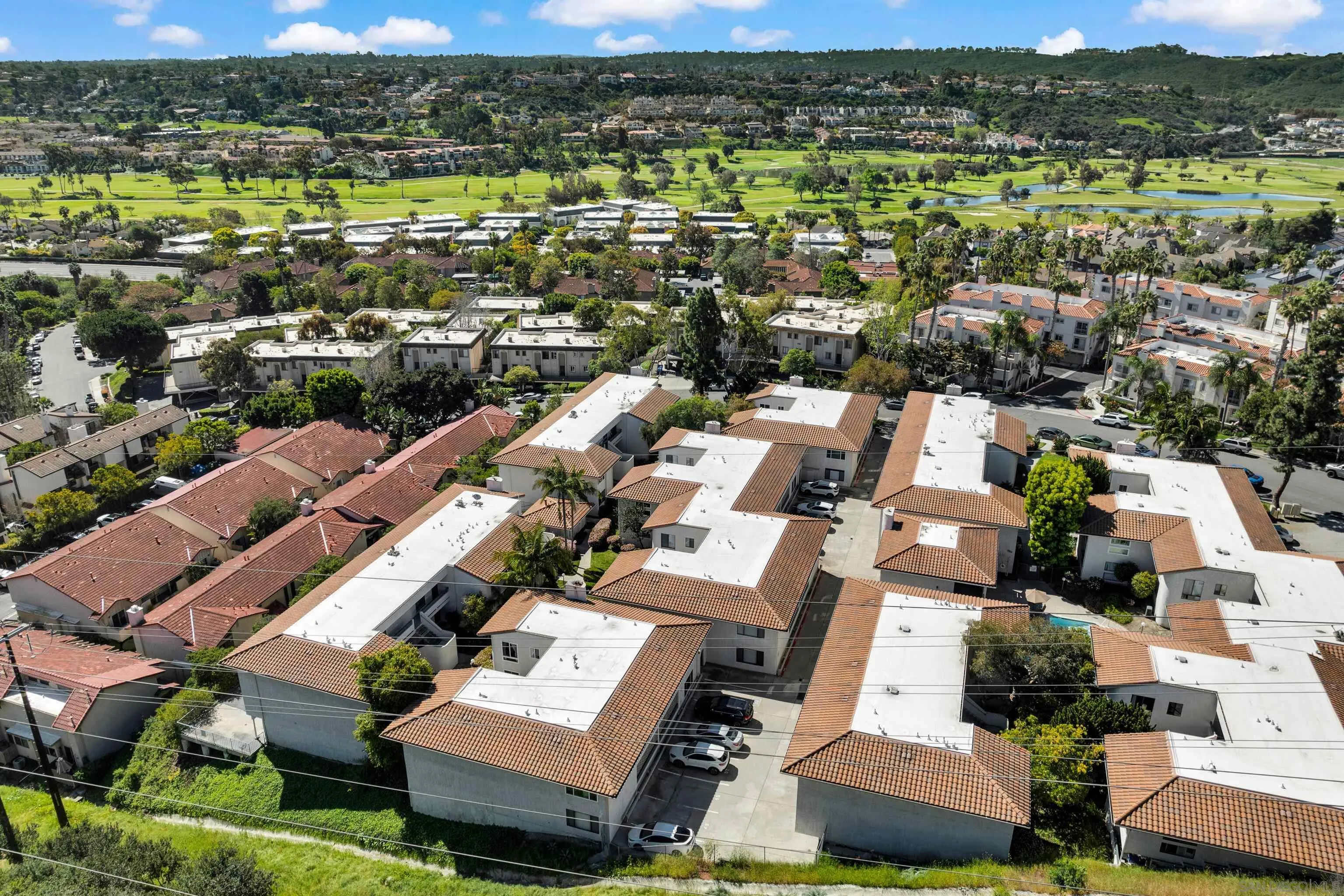 2308 Altisma Way, Unit 118 Carlsbad, CA 92009 - Photo 9 of 51 an aerial view of residential houses with outdoor space
