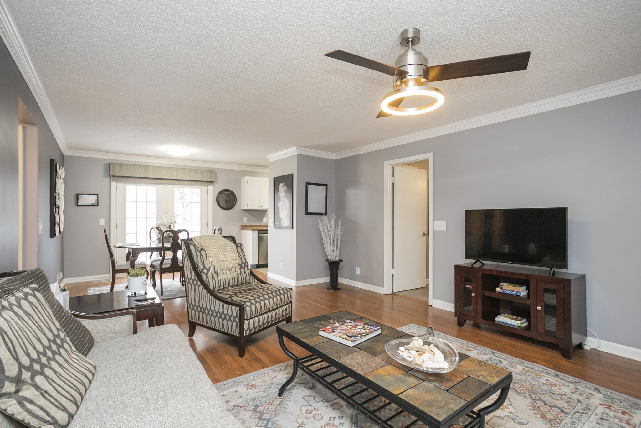 1464 Autumn Knoll Road Hermitage, TN 37076 - Photo 11 of 46 a living room with furniture and a flat screen tv